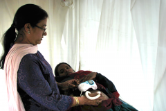 Healthcare-staff-conducting-ante-natal-examination