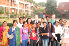 Irish-Cricketer-Kevin-OBrien-with-the-students-from-Asha-slums-Dr.-Kiran-and-the-Asha-team-1