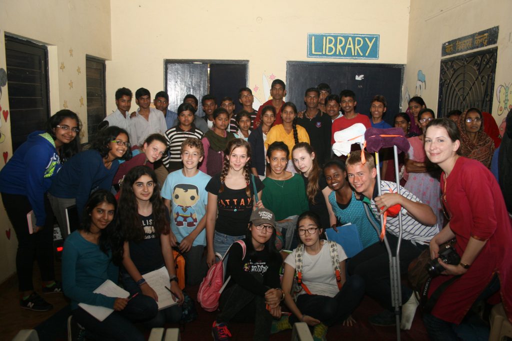 American Embassy School students visit Kusumpur Pahari slum colony