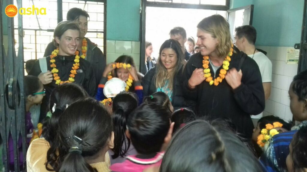 Trinity College was welcomed with garlands at the Seelampur centre.