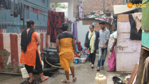Dr Monica entering the Kanak Durga slum community 