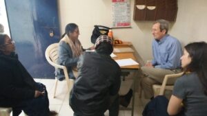 Dr John Peteet (Psychiatrist) attending patients at Seelampur slum community