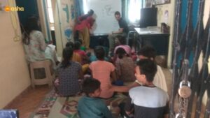 Jeremy conducting a class for Asha Students in Kusumpur Pahari slum