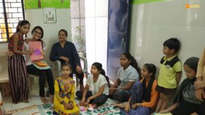 Ms Soni, Avantika and children at the centre