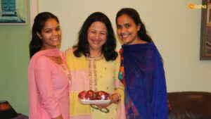 Dr Kiran celebrates her birthday with the community