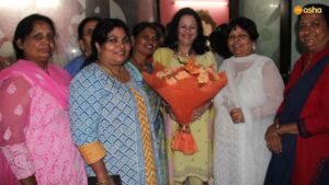 Dr Kiran with the Asha Staff