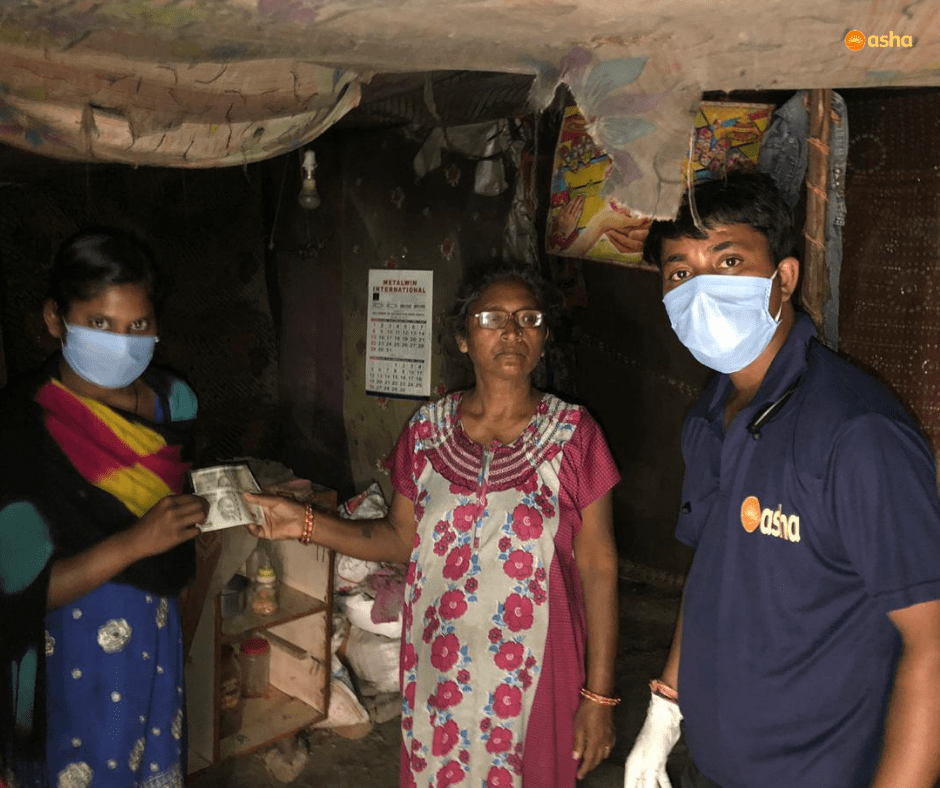 Asha provides financial aid to slum dwellers by the river bed