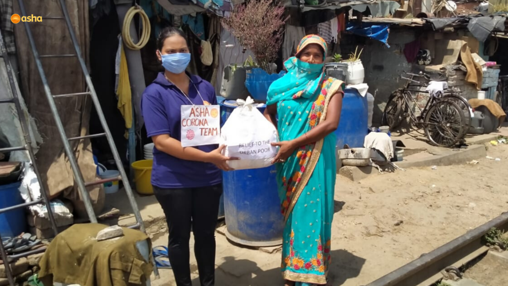 Asha COVID-19 Emergency Response: Asha warriors hand out essential groceries to the slum residents