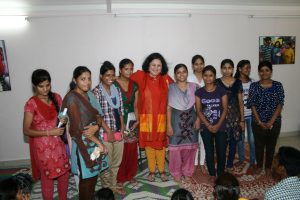 Dr. Kiran with nursing students from various Asha slums