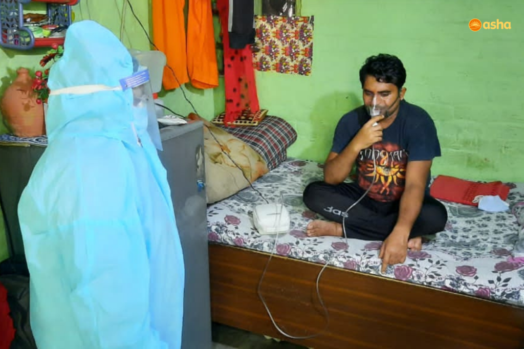 Asha COVID-19 Emergency Response: Asha team and Asha warriors monitor covid positive patients in the slums