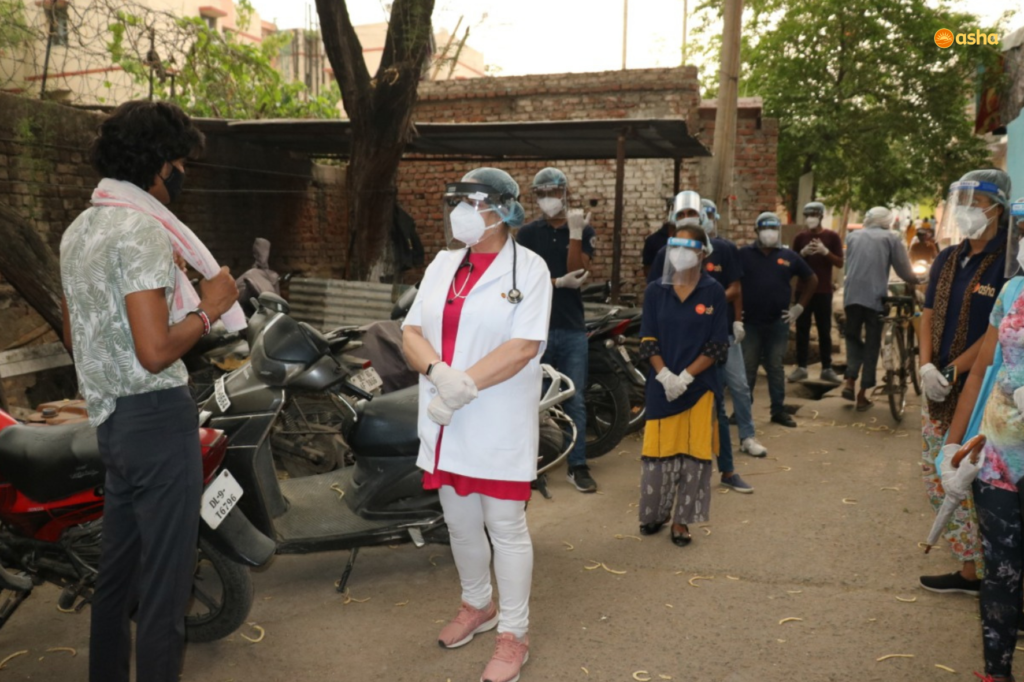 Asha COVID-19 Emergency Response: Dr Kiran visits Kusumpur Pahadi slum community where Asha is fighting the spread of covid