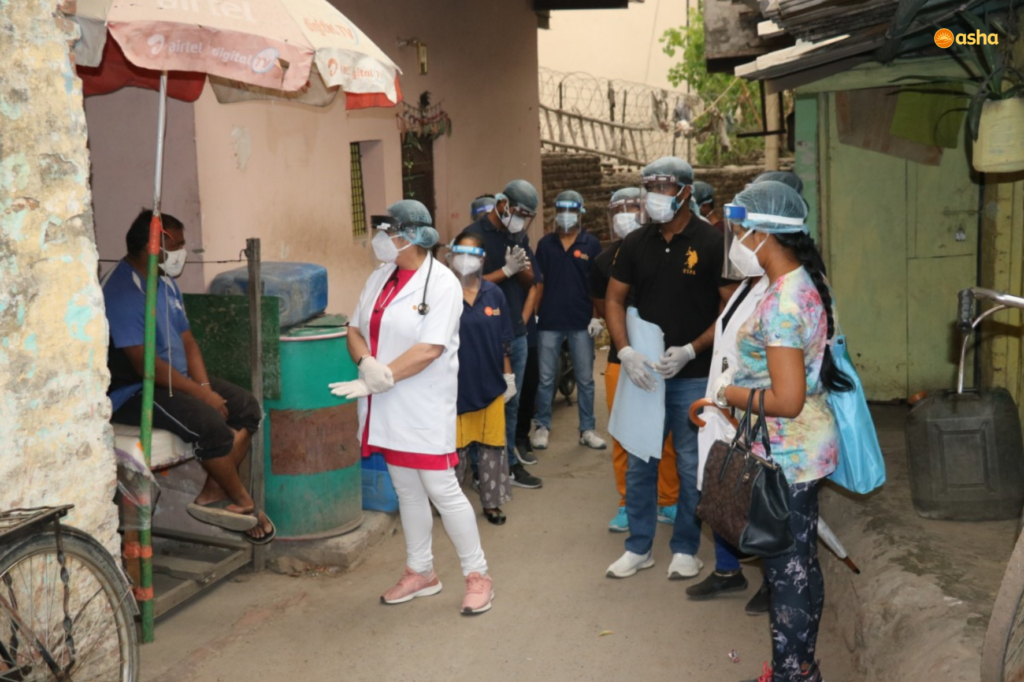 Asha COVID-19 Emergency Response: Dr Kiran visits Kusumpur Pahadi slum community where Asha is fighting the spread of covid