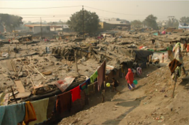 typical slum in Delhi - shanty huts